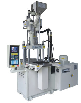 Machine de moulage par injection de caoutchouc verticale à double glissement pour boîtier de téléphone