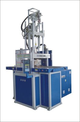 Machine de moulage par injection de caoutchouc verticale à double glissement pour boîtier de téléphone