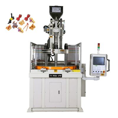 Machine de moulage par injection verticale avec table tournante