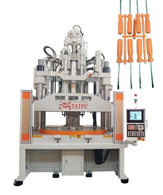 Machine de moulage par injection verticale avec table de travail basse