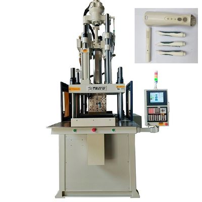 Machine électrique pour la fabrication de brosses à dents, machine de moulage par injection à glissement unique verticale