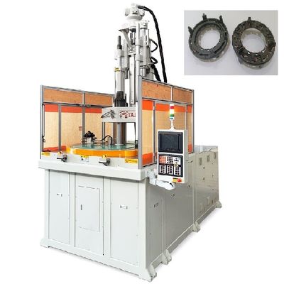 Machine de moulage par injection à table rotative verticale utilisée pour les porte-ampoules de phares automobiles