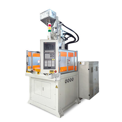 Machine de moulage par injection de plastique rotatif verticale à haut rendement pour la fabrication de taches