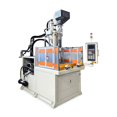 Machine de moulage par injection de plastique rotatif verticale à haut rendement pour la fabrication de taches