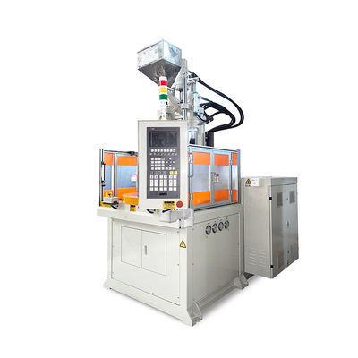 Machine de moulage par injection de plastique rotatif vertical à haut rendement pour la fabrication de jouets