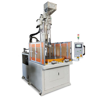Machine de moulage par injection de plastique rotatif vertical à haut rendement pour la fabrication de pièces automobiles
