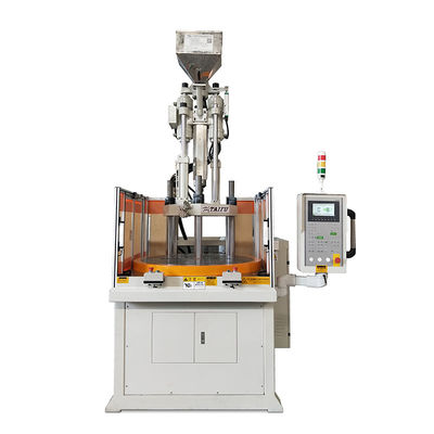 Machine de moulage par injection de plastique rotatif vertical à haut rendement pour la fabrication de poignées