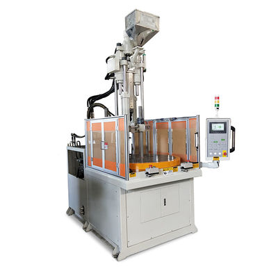 Machine de moulage par injection de plastique rotatif vertical à haut rendement pour la fabrication de pièces automobiles